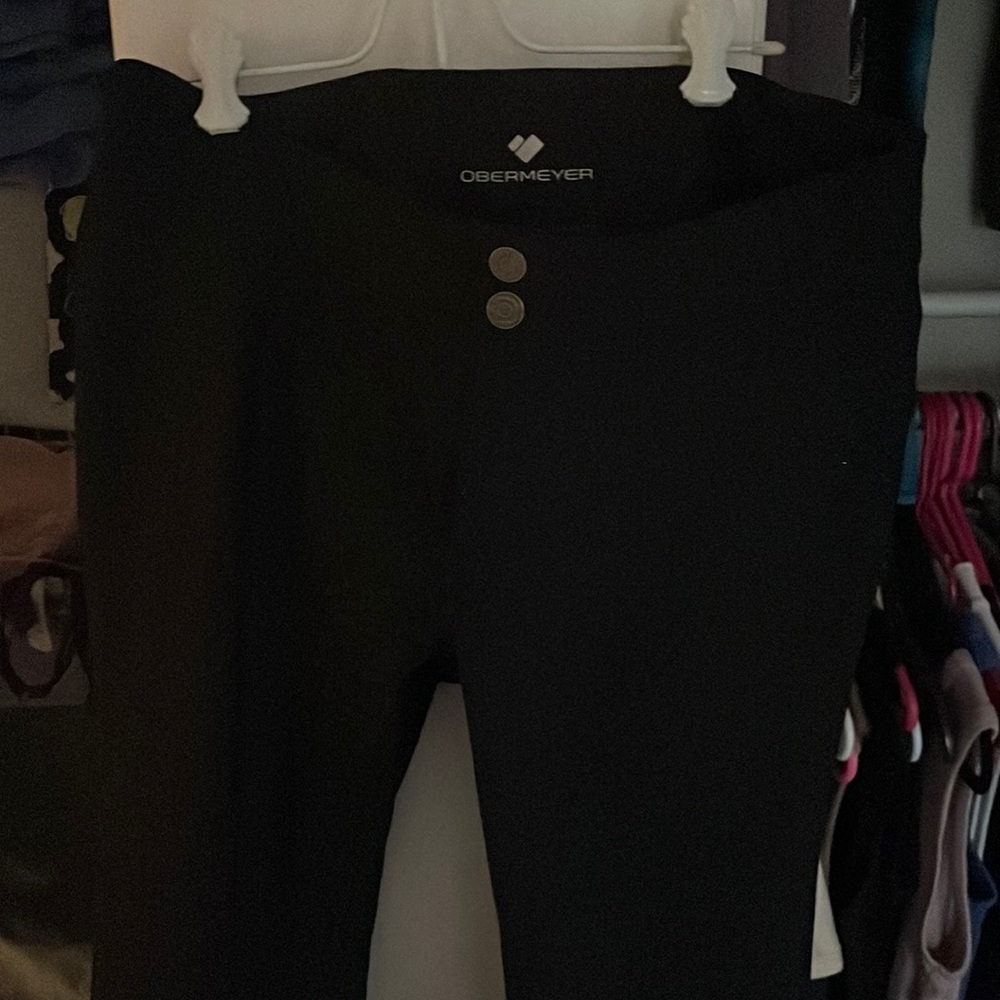 Black Obermeyer bell bottom ski pants